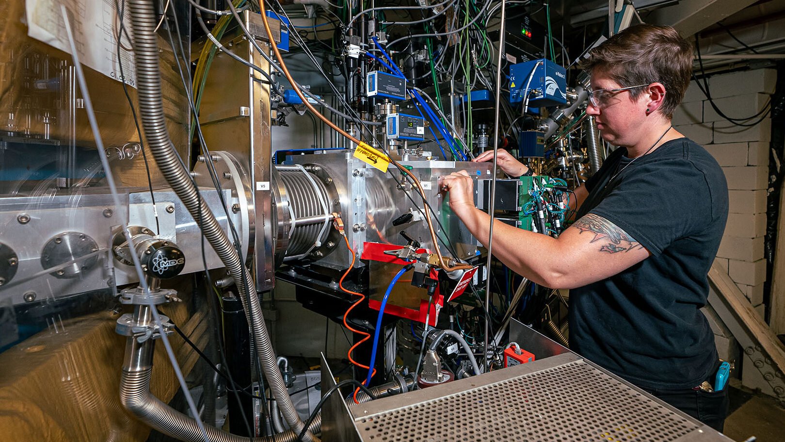 A scientist working on a separator in the experiment. Photo: Marilyn Sargent/Berkeley Lab