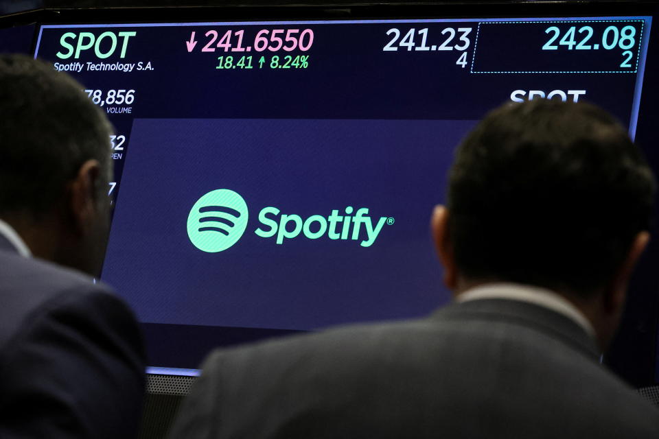 A screen shows the logo and trading information for Spotify on the floor of the New York Stock Exchange (NYSE) in New York City, U.S., February 6, 2024. REUTERS/Brendan McDermid